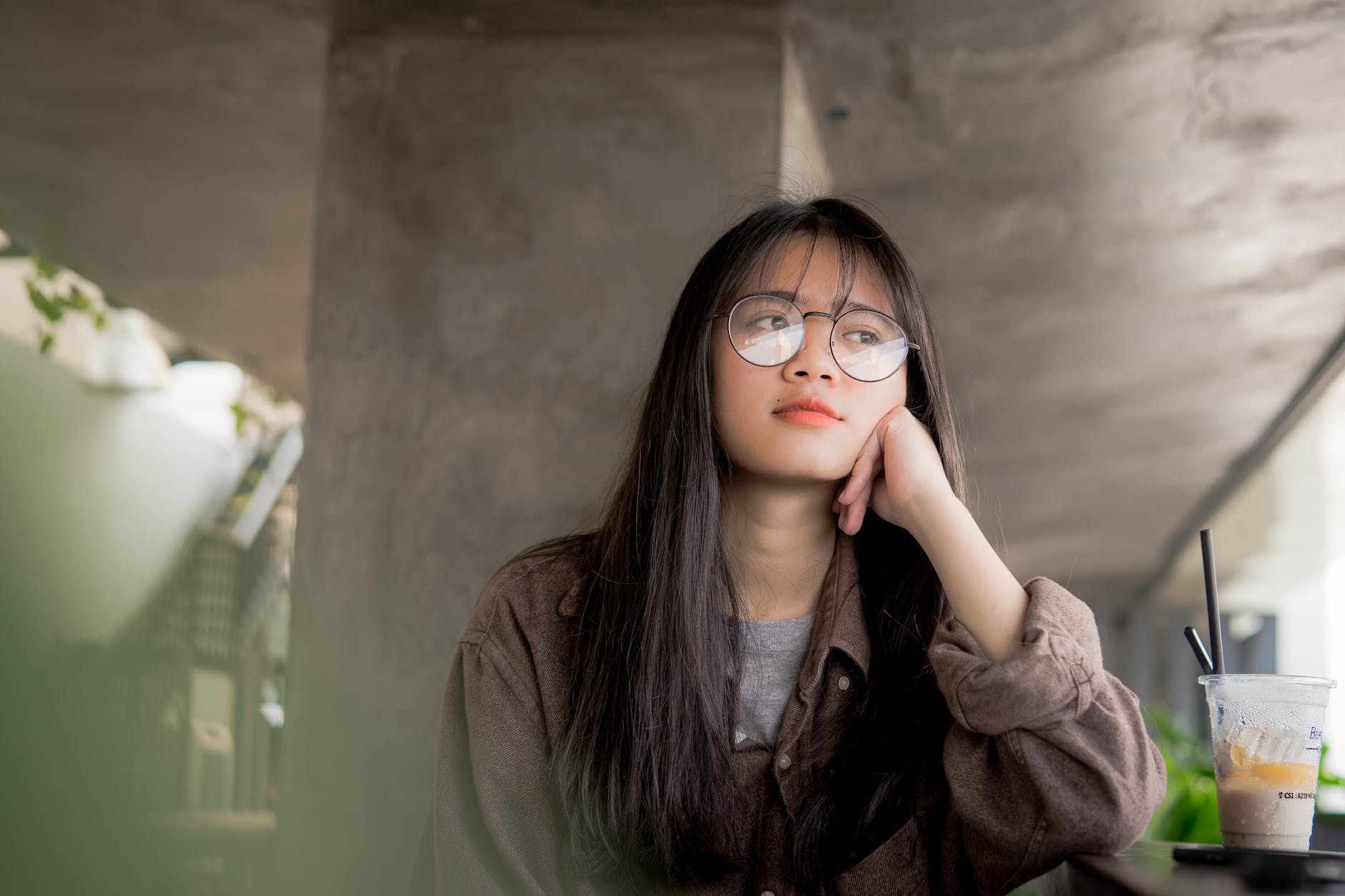 woman in brown top